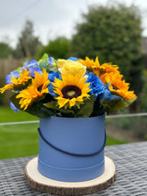 Load image into Gallery viewer, Blue Hatbox with Faux Sunflowers and Roses
